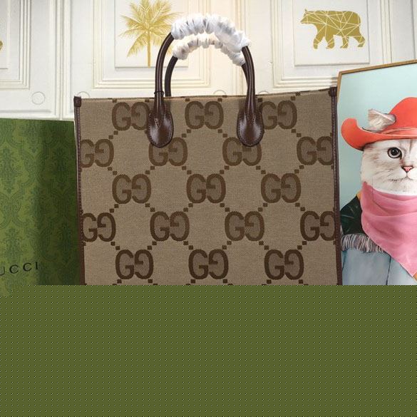 G*u*i shopping bags